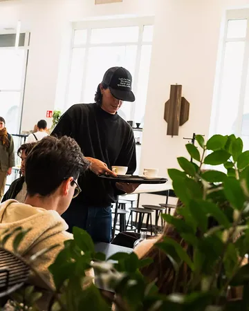 SERVED
WITH A SMILE. ☕️

See you at Frank.