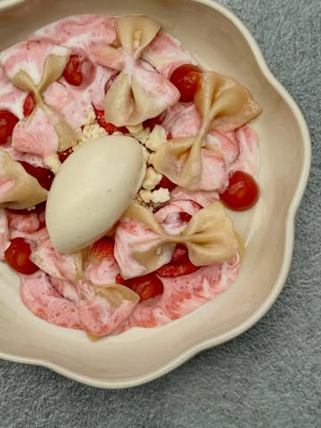 Yes, in Poland we eat pasta with strawberries for dessert and we’re doing just fine!

It’s a beloved Polish comfort food, often enjoyed as a light lunch or dinner during strawberry season. This traditional summer dish combines cooked pasta with fresh strawberries and sour cream.

We decided to have some fun with the classic: homemade farfalle, smoked cream for depth, and a little pink pepper to keep things fresh and cheeky.

@iga.swiatek guess what? Your favourite summer pasta is here 🍓