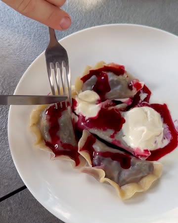 Pierogi z jagodami (bilberry dumplings) - the essence of Polish summer💟

A few summer moments of us celebrating seasonal fruits, enjoying food together, and sharing experiments with our guests. But first, the quality test.

Keep testing.

Upside down cake with nectarines (and brown butter).

🍒 clafoutis with polenta cream from Monika’s recipe.

🪄3..2..1..keep testing.

Pancake cake - childhood dream unlocked.

Blackberry pate de fruit.

Blackcurrant simple mom’s cake.

Mini choux with buckwheat pastry cream.

Strawberry galette 🍓

Just a little piece topped with purple elderflower syrup and brown butter ice cream. More than enough❤️

Brioche …loading…

Pasta & Strawberries 🇵🇱

A delicious delivery of bilberry buns, straight from our friends from Warsaw. The sweetest surprise.

Pancakes recipe:
450g milk
150g flour
3 eggs
Salt
Vanilla

Sweet pickled carrots for our cheese selection.

Parmigiana di Melanzane 🤌🏼

Klopsiki (meatballs)
“Pull up a chair. Take a taste. Come join us. Life is so endlessly delicious.” R. Reichl

Baambruge pork jowl test: juicy, super tender meat, crispy skin, and a fishbone glaze to finish.